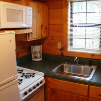 A kitchen in a cabin.