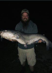 Man holding very large fish